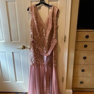Beautiful mauve gown. Never worn. Mauve sequence on body,